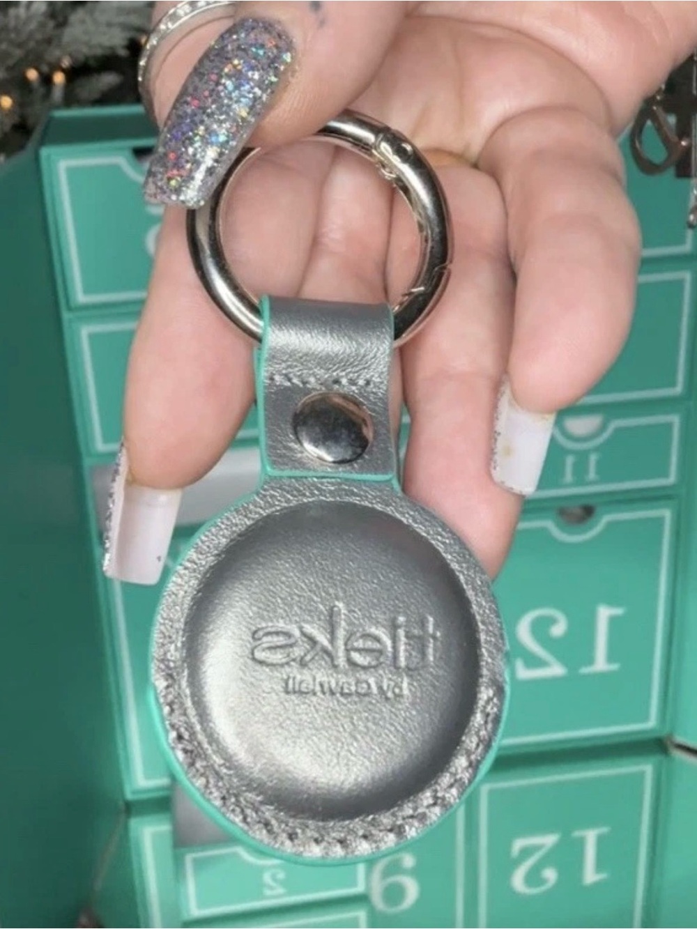 TIEKS AIR TAG HOLDER PEWTER! RARE! NEVER USED! ADVENT KEYHOLDER EXCLUSIVE!
